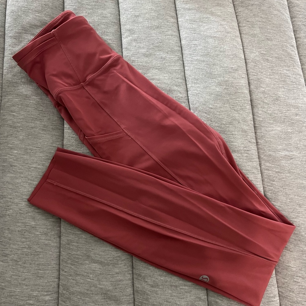 lululemon pink leggings with side pockets, worn once